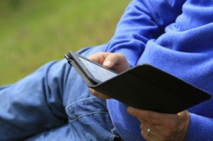 Man-Reading-Kindle-by-Tina-